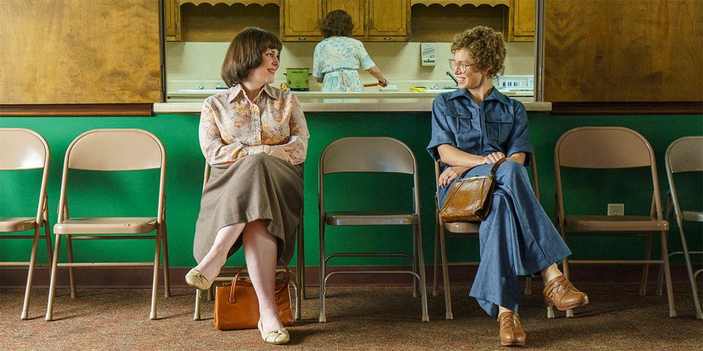 Candy - Jessica Biel and Melanie Lynskey sitting on chairs and looking at each other