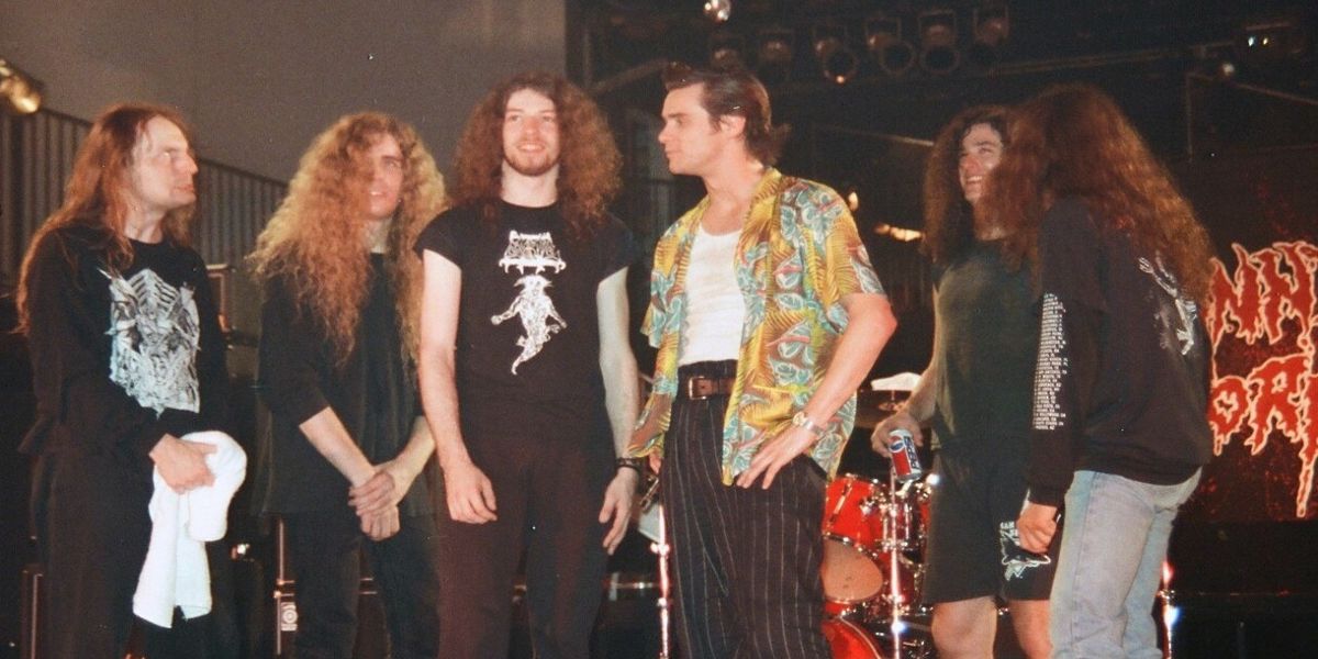 A behind-the-scenes shot of the band Cannibal Corpse on the set of Ace Ventura: Pet Detective.