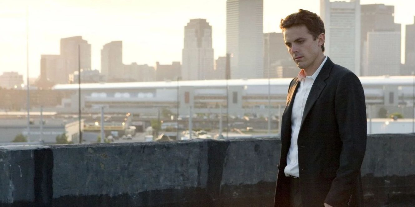 Casey Affleck standing by the pier in Gone Baby Gone 