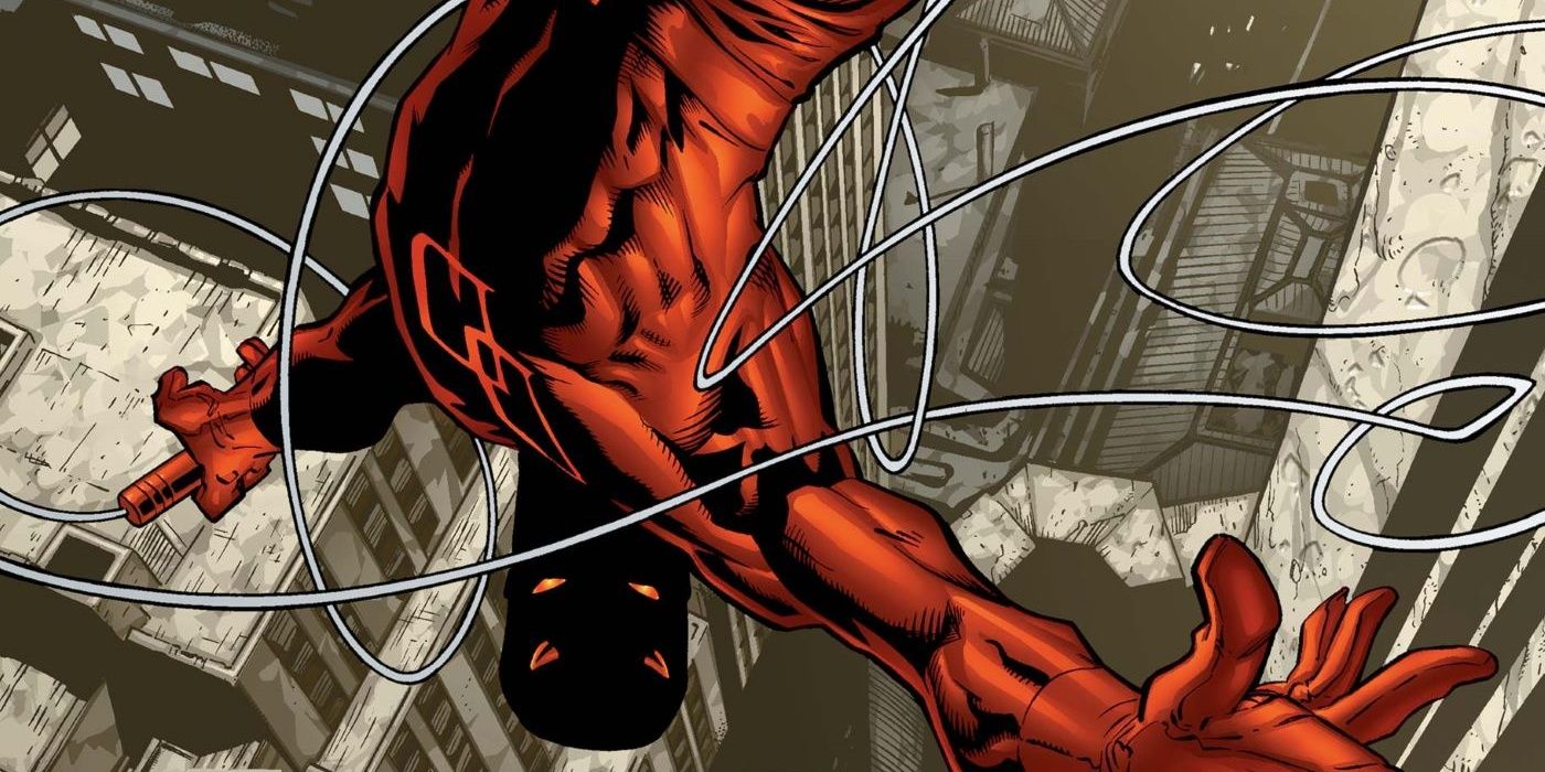 Daredevil, oriented upside down towards the viewer, swings above the New York City skyline with his grappling rope swirling around him.