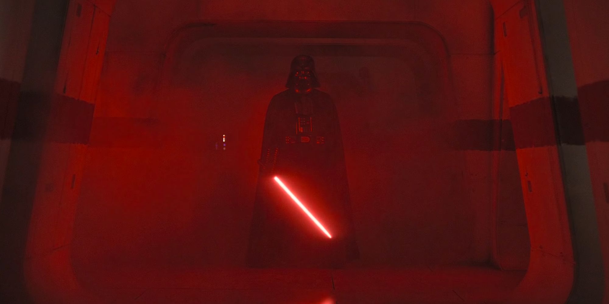 Darth Vader igniting his lightsaber in the hallway if Rogue One A Star Wars Story