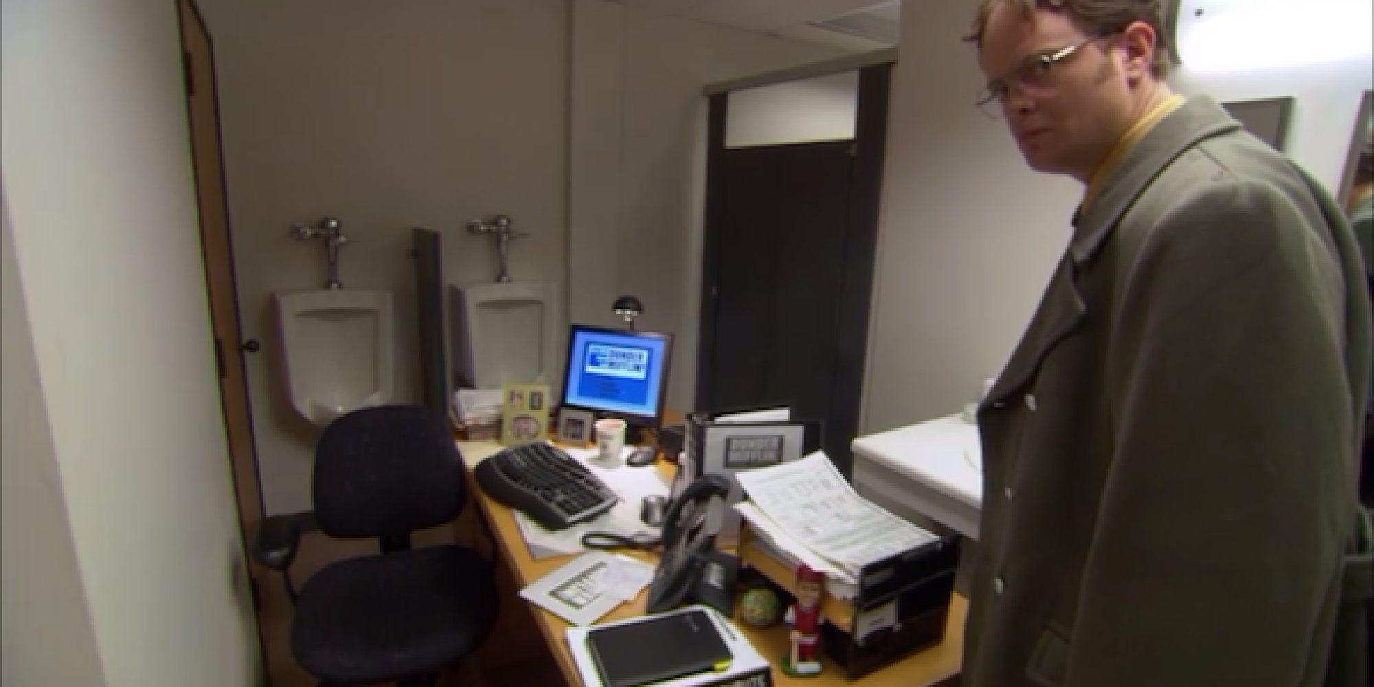 Dwight finding his desk in the bathroom on The Office