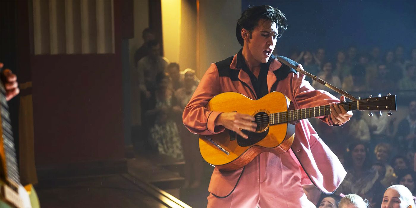 Austin Butler playing guitar as Elvis in Elvis