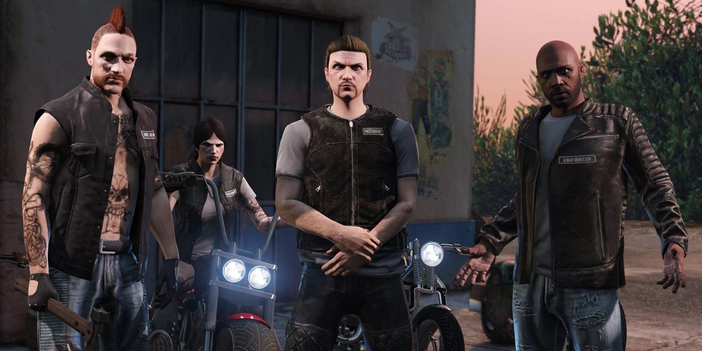 A group of bikers in GTA Online, posing with their motorcycles outside of a warehouse.