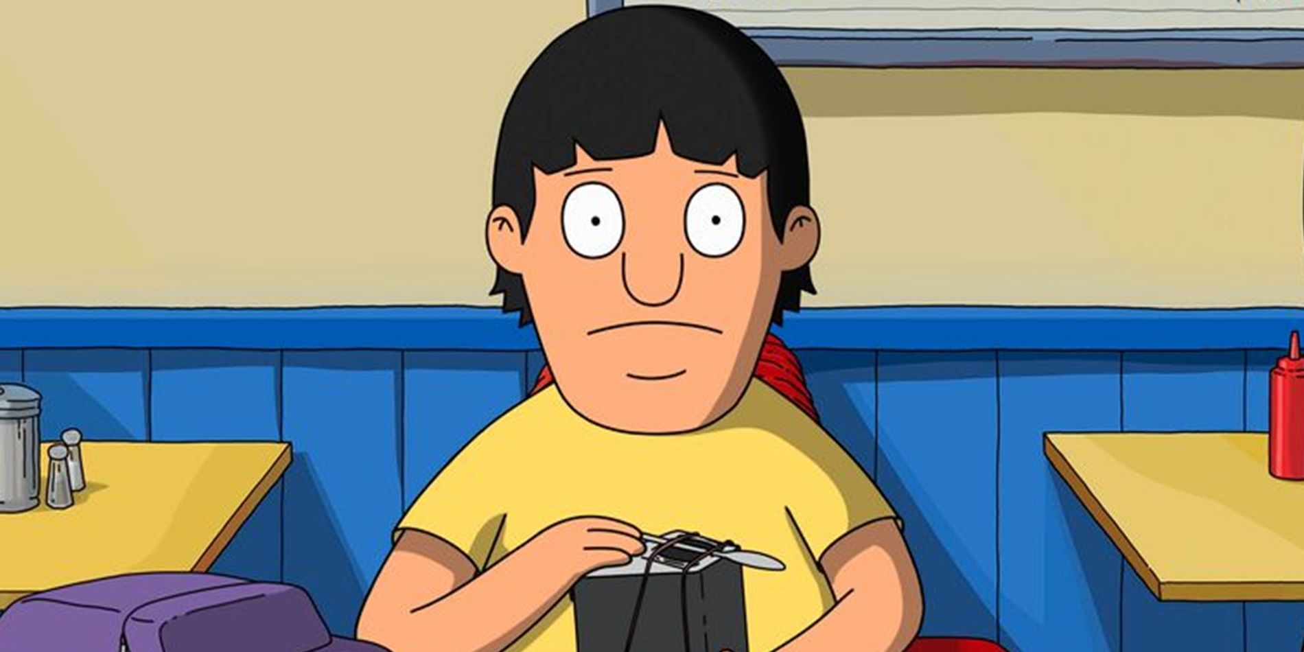 Gene holding his homemade musical instrument in The Bob's Burgers Movie