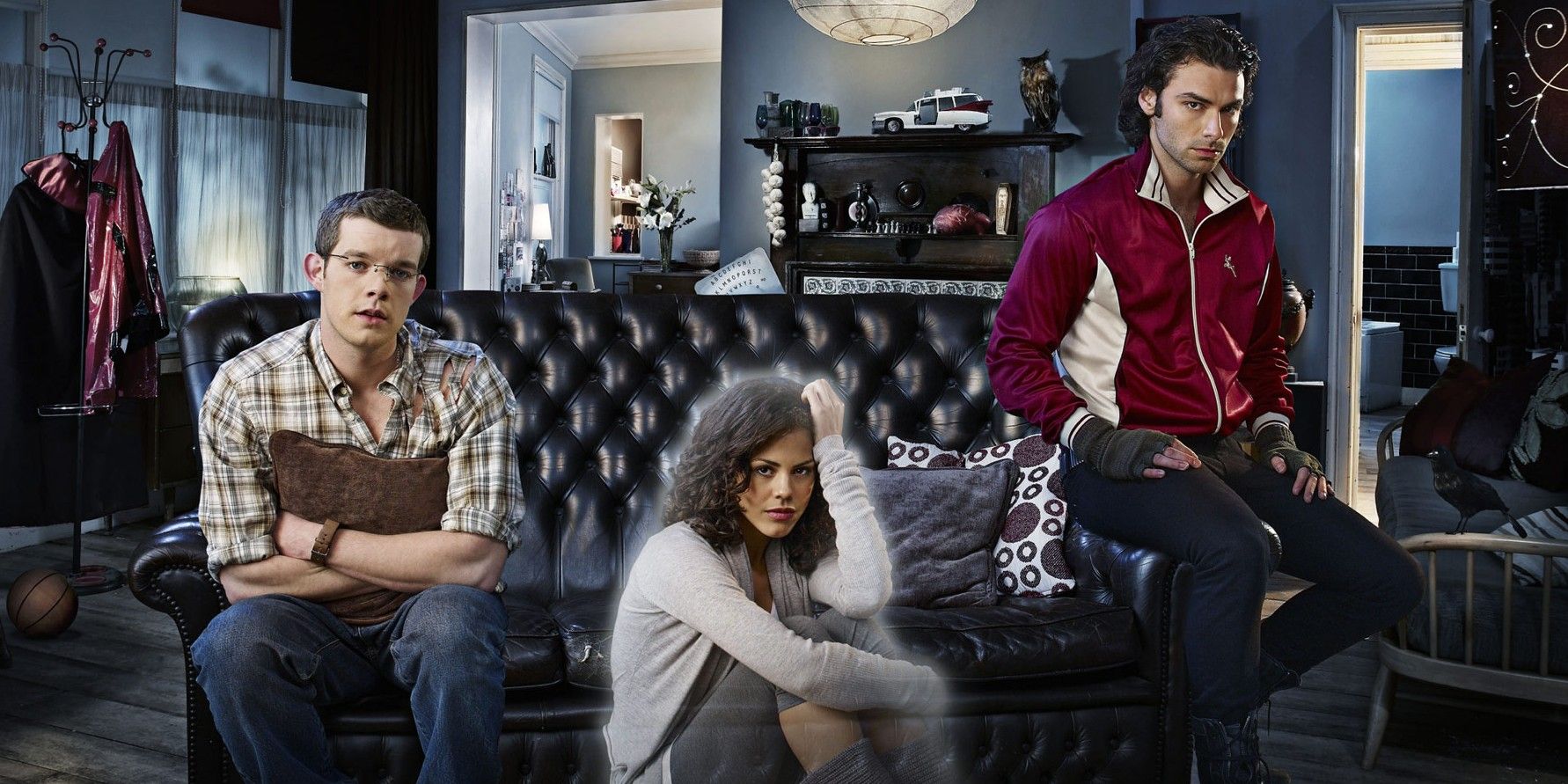 George, Annie and Mitchell sitting in their apartment on the set of Being Human
