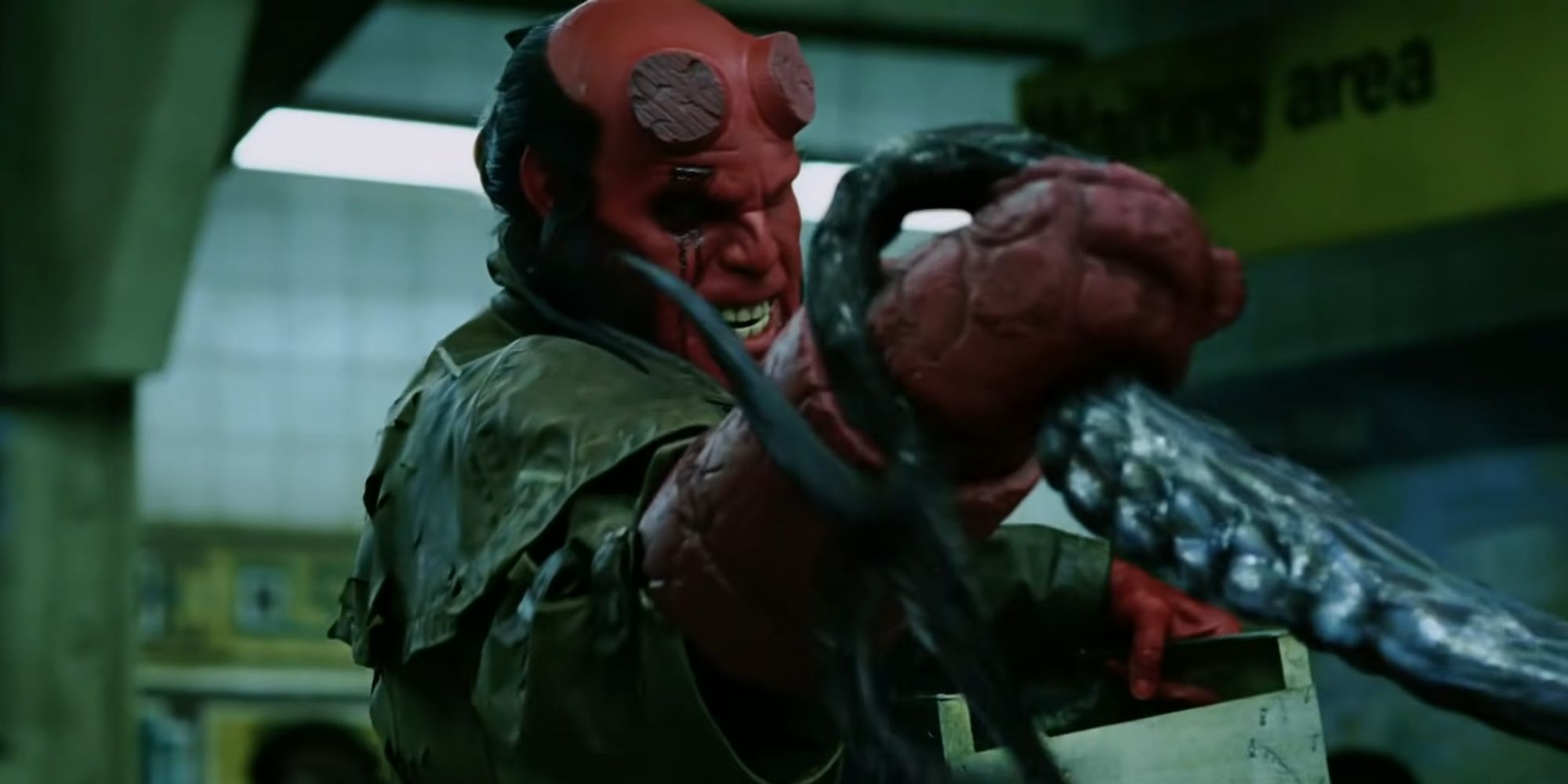 Hellboy grabbing Sammael's tongue in Hellboy 2004