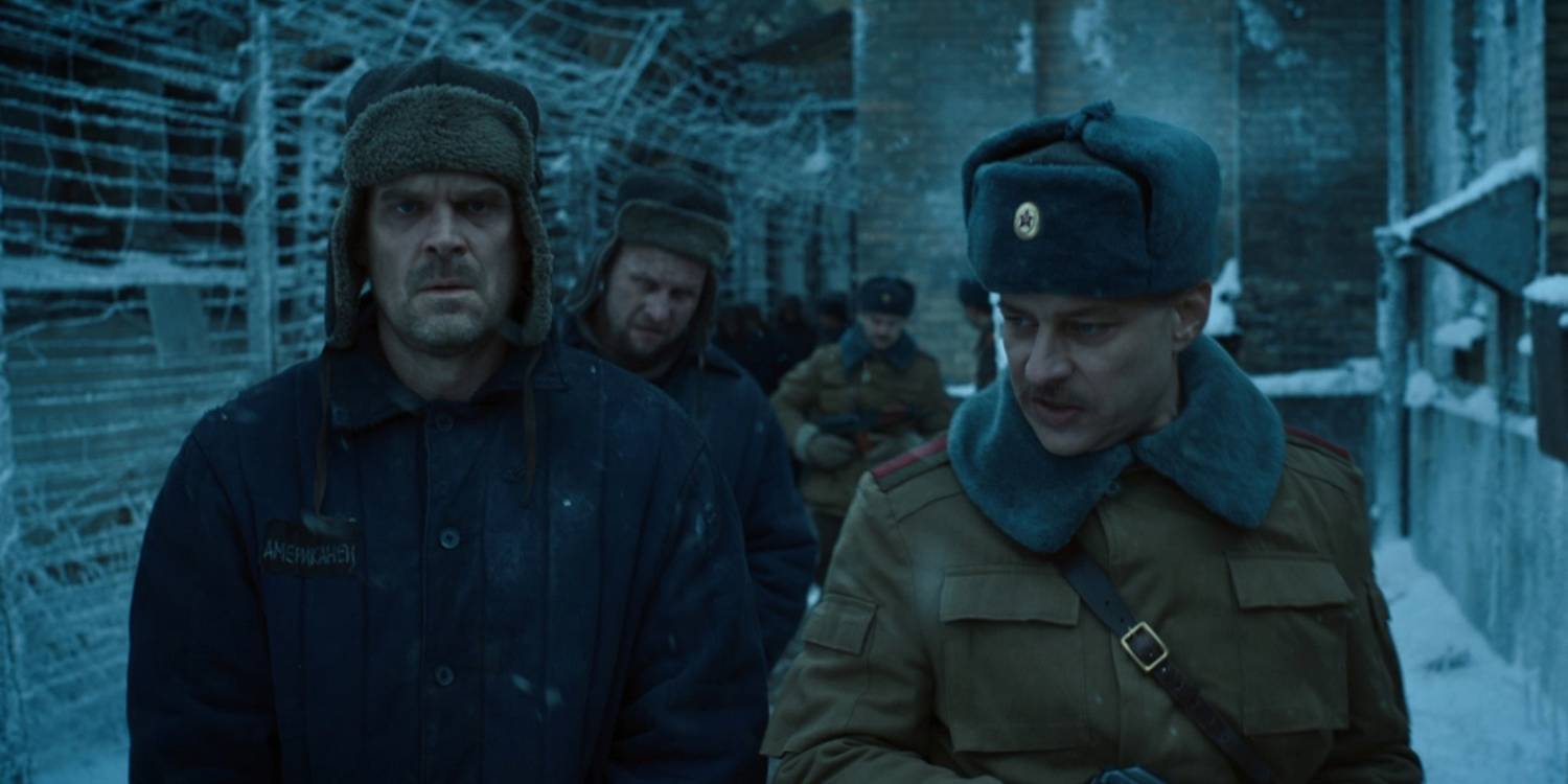 Hopper-and-Dmitri-talking-in-a-Russian-prison-on-Stranger-Things.jpg