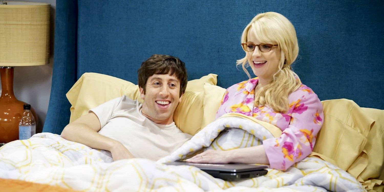 Howard and Bernadette in bed together smiling