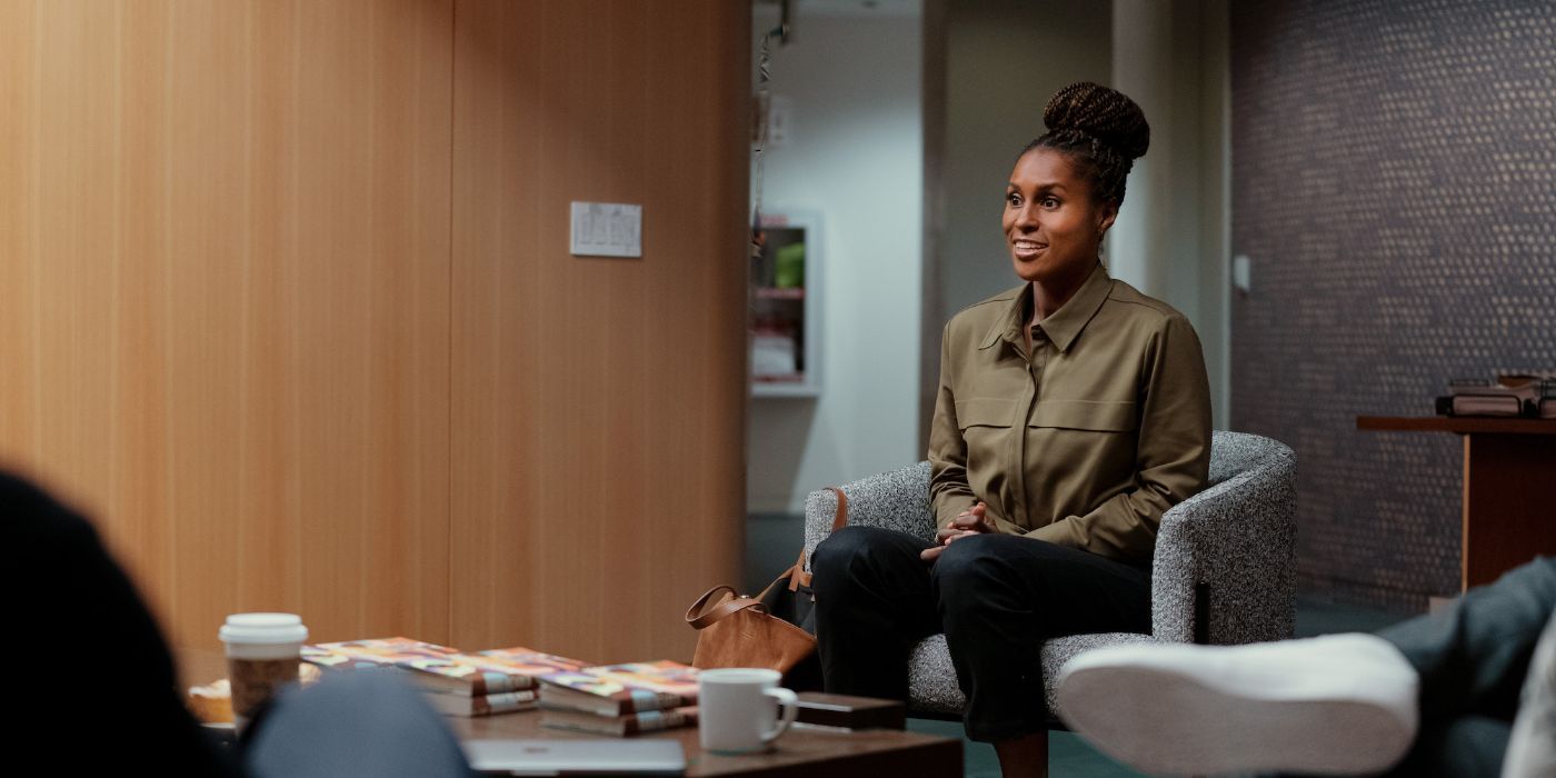Issa Rae sits in a meeting on Roar