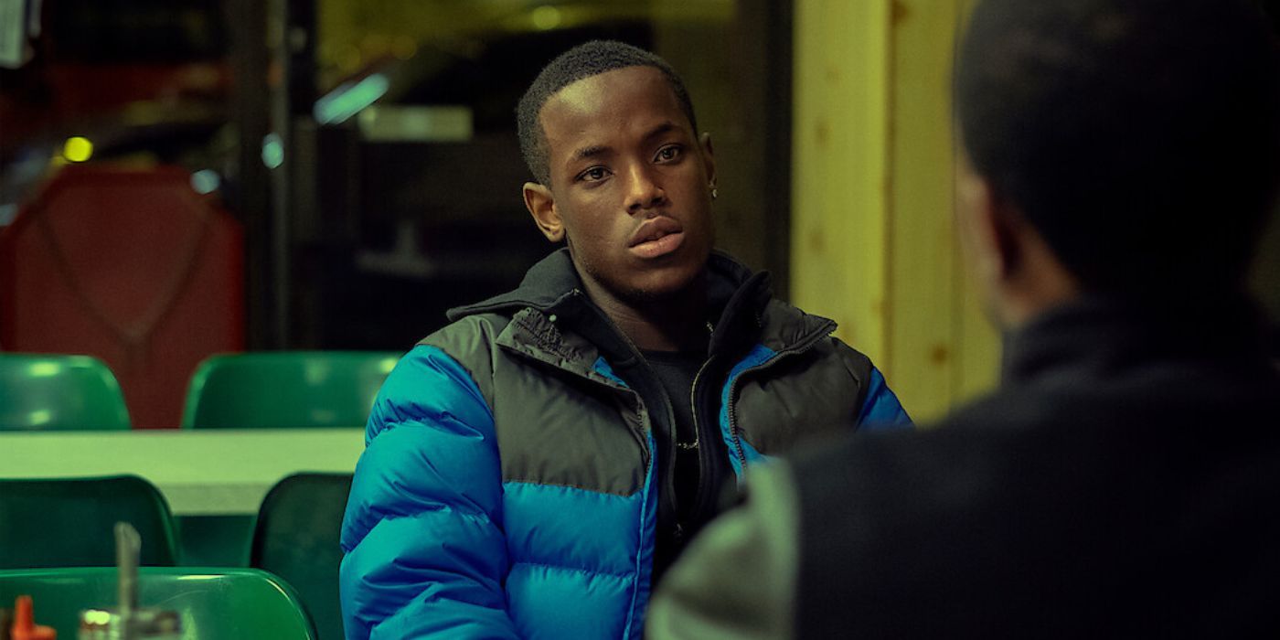 Jamie (Michael Ward) at a diner with another in Top Boy.
