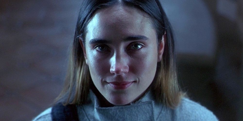 Marion (Jennifer Connelly) smiling at the camera in Requiem for a Dream