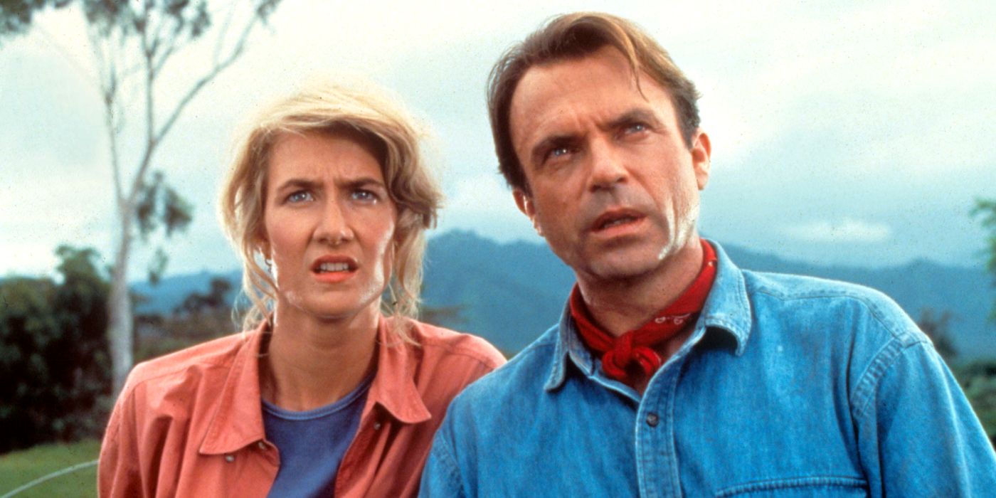Ellie and Alan look up at long-neck dinosaurs in Jurassic Park