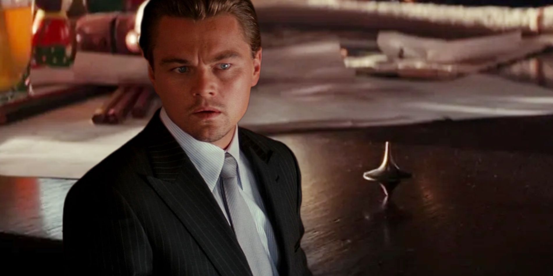 Leonardo DiCaprio in Inception Next To The Spinning Top Totem