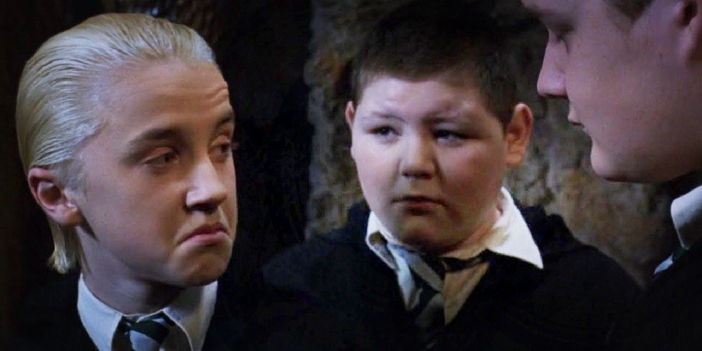 Malfoy makes a face at Goyle after realizing he can read in Harry Potter