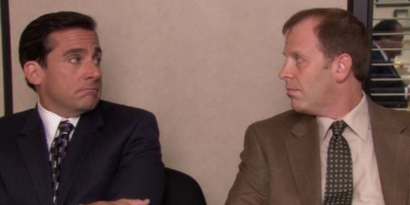 Michael and Toby look at each other in The Office