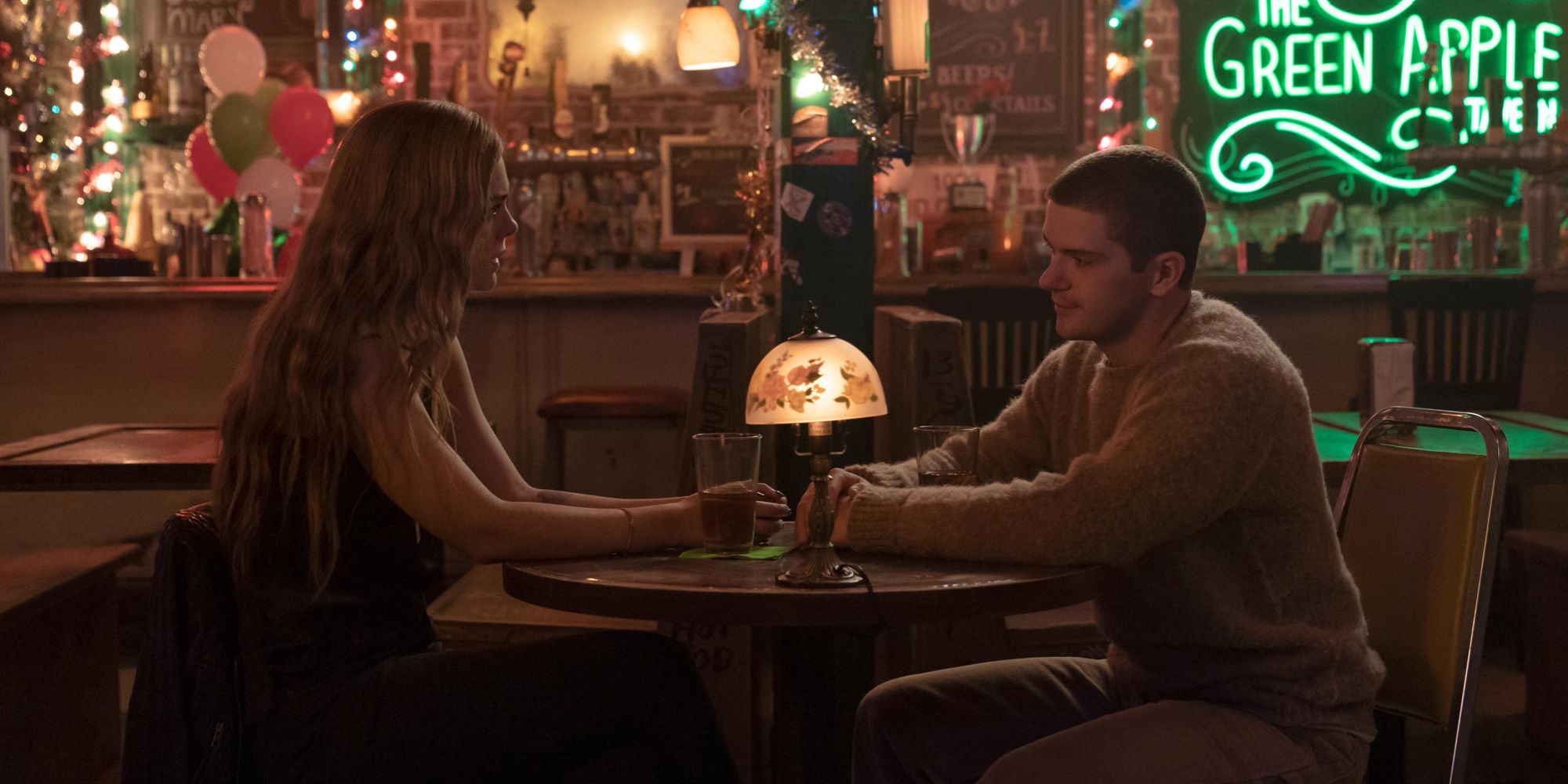 Michelle and Conrad at a bar on The Girl From Plainville