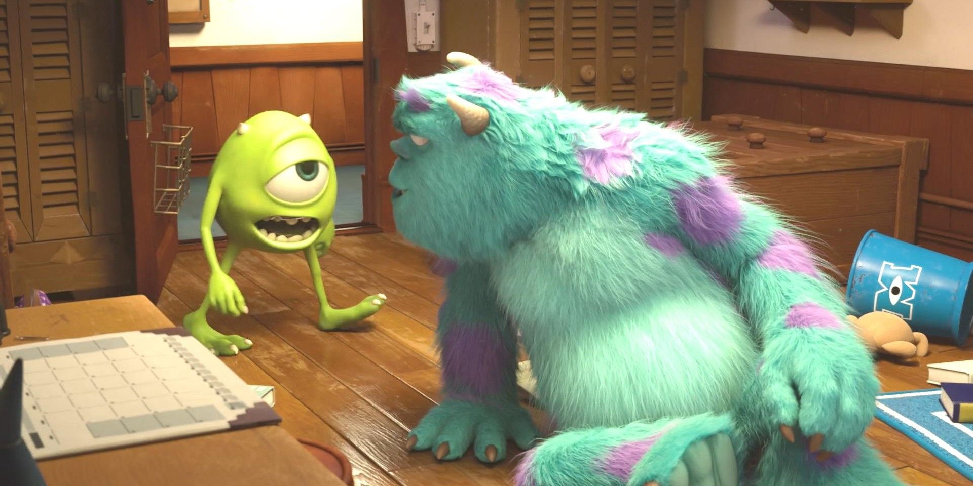 Mike and Sully talk in a dorm in Monsters University