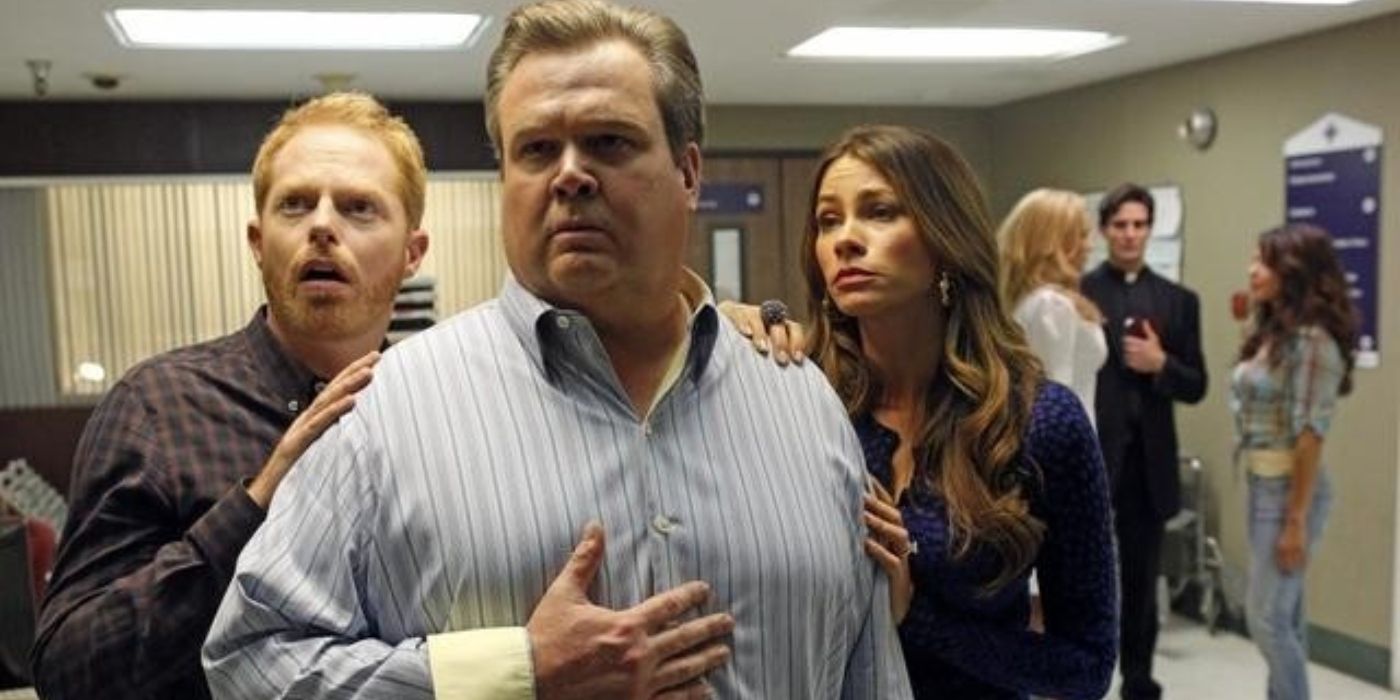Mitch, Cam and Gloria looking sad at the hospital on Modern Family