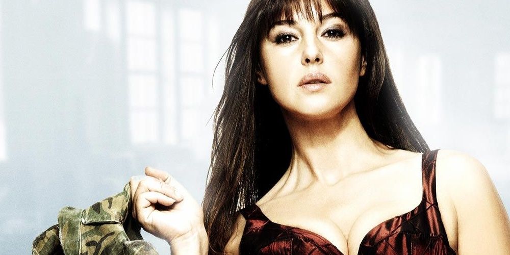 Monica Bellucci holding a coat in Shoot Em Up Cropped