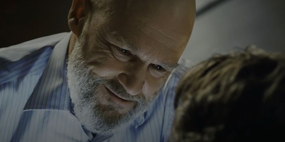 Obadiah Stane with an evil smile in Iron Man