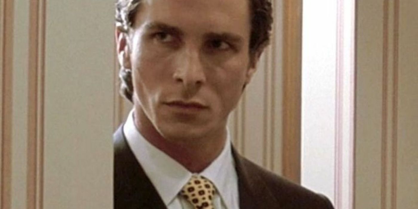 Patrick puts on leather gloves in American Psycho