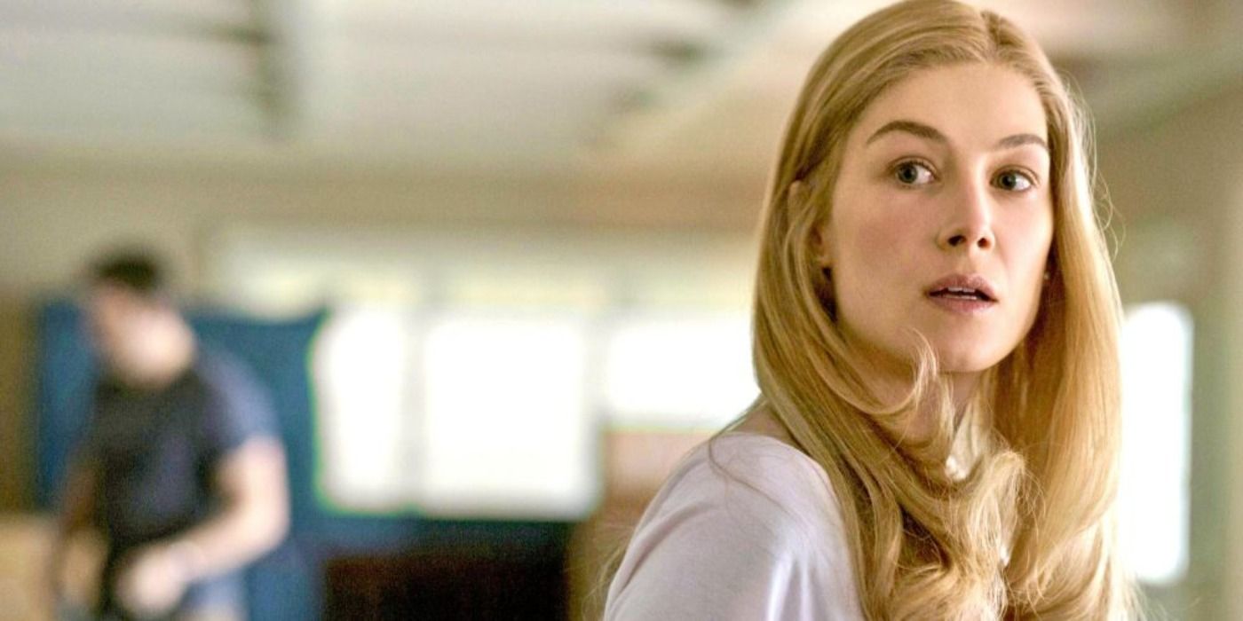 Rosamund Pike looking over her shoulder in Gone Girl