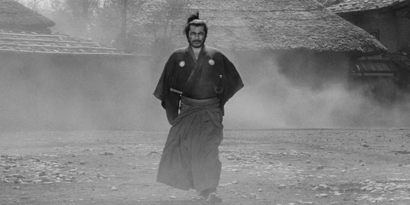 Sanjuro walks out of the fog.