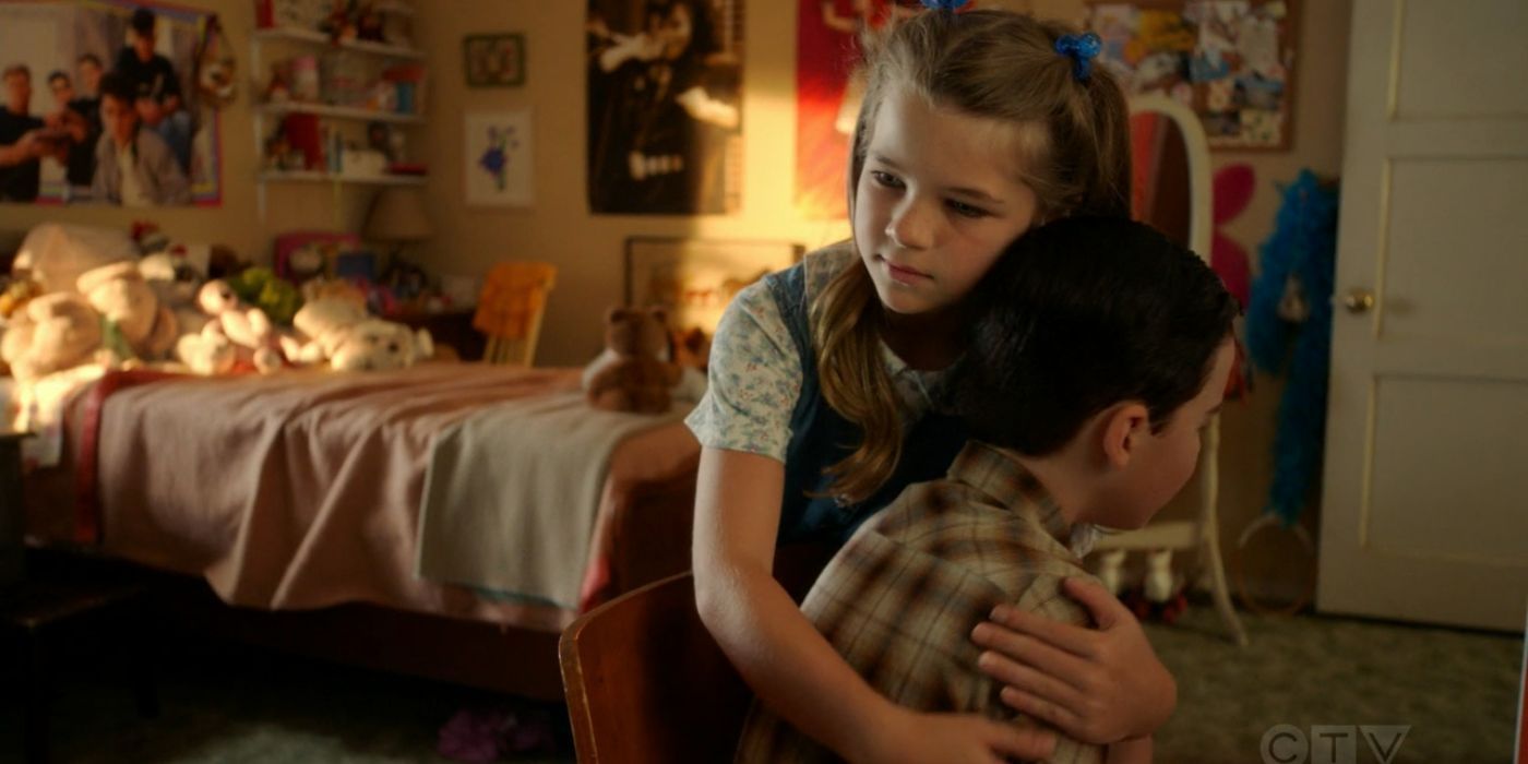 Sheldon and Missy hugging in Young Sheldon