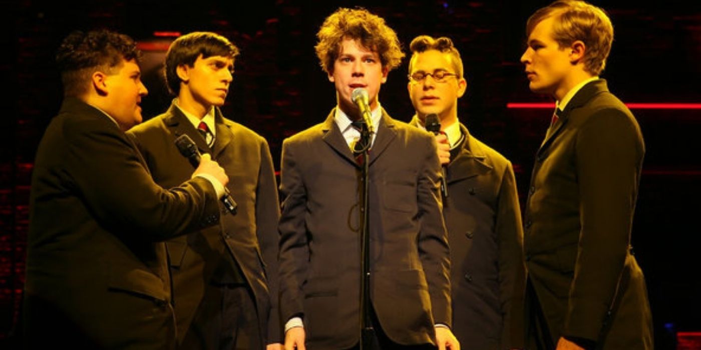 Moritz and the male cast of Spring Awakening singing.