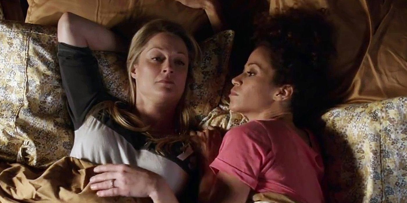 Stef and Lena lay in bed together