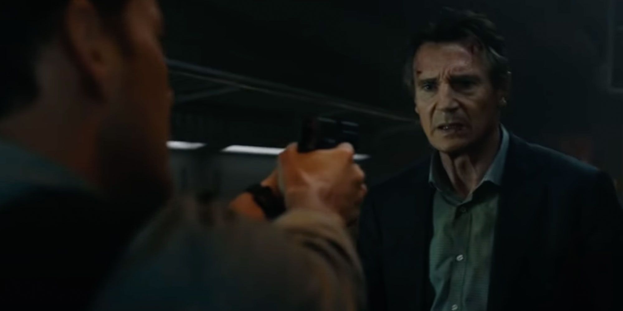 Liam Neeson at gunpoint in The Commuter