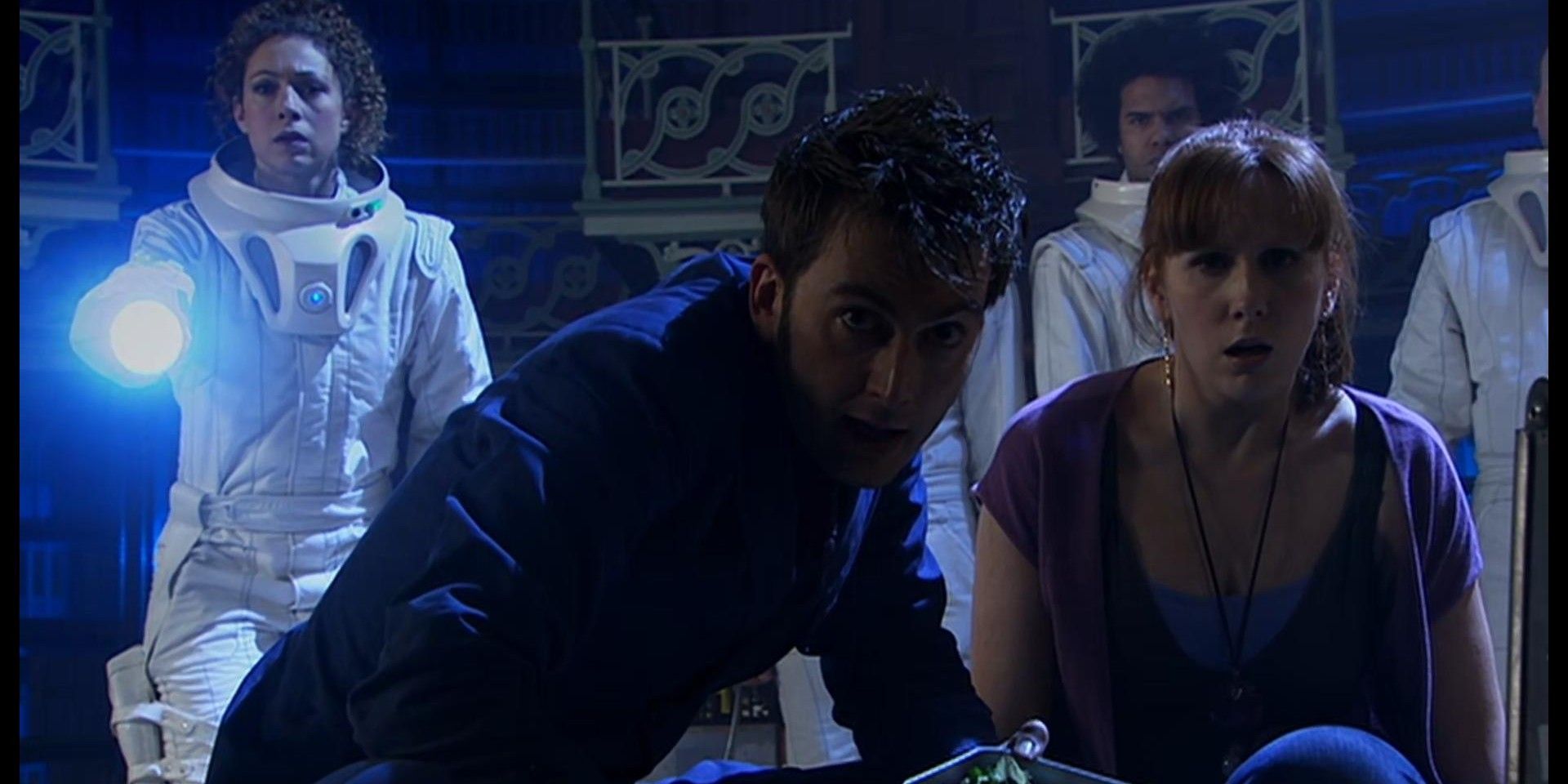 The Doctor Donna and River Song staring worriedly into the camera in Doctor Who