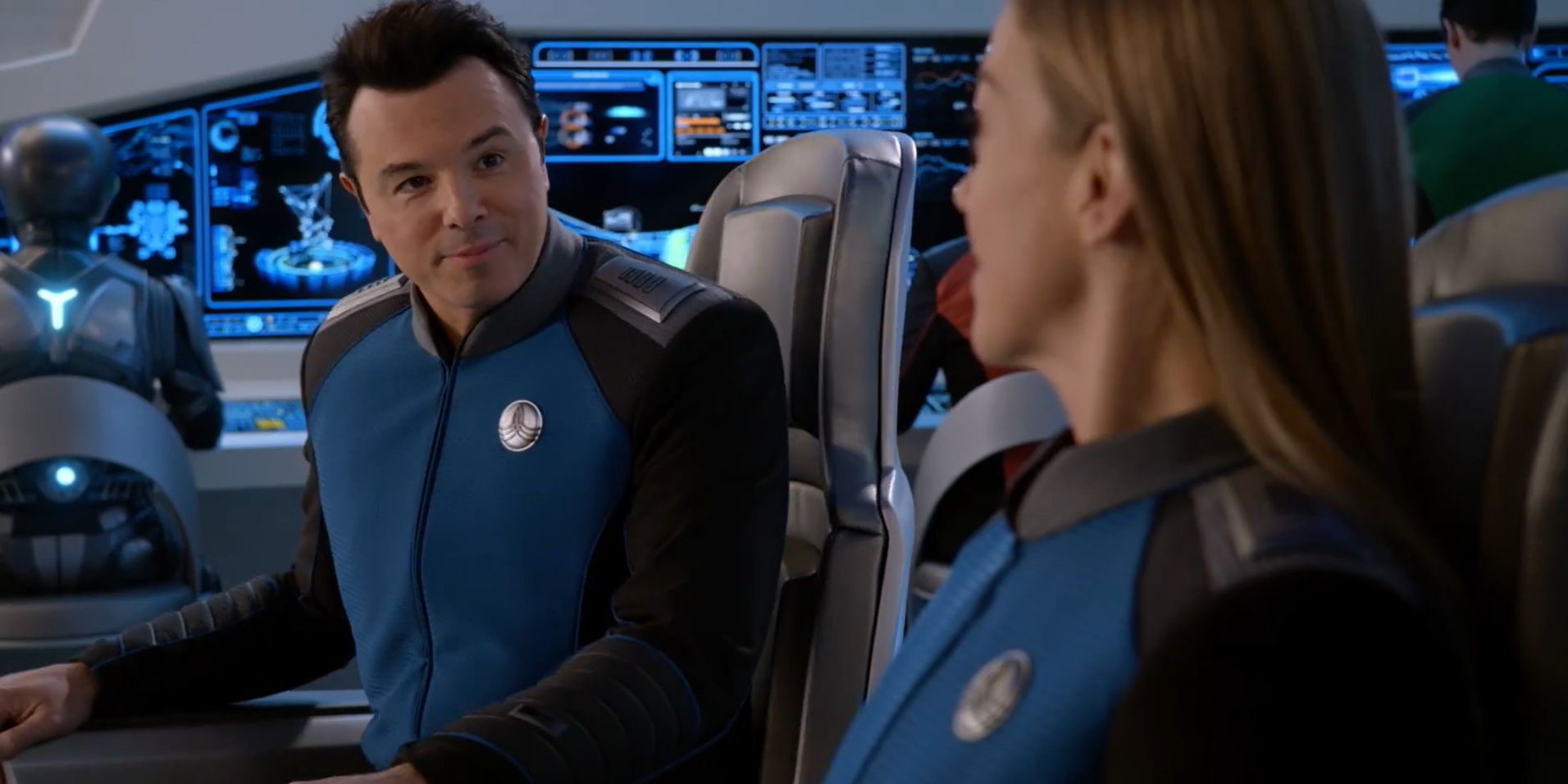 Seth McFarlane and Adrianne Palicki seated on the bridge in The Orville