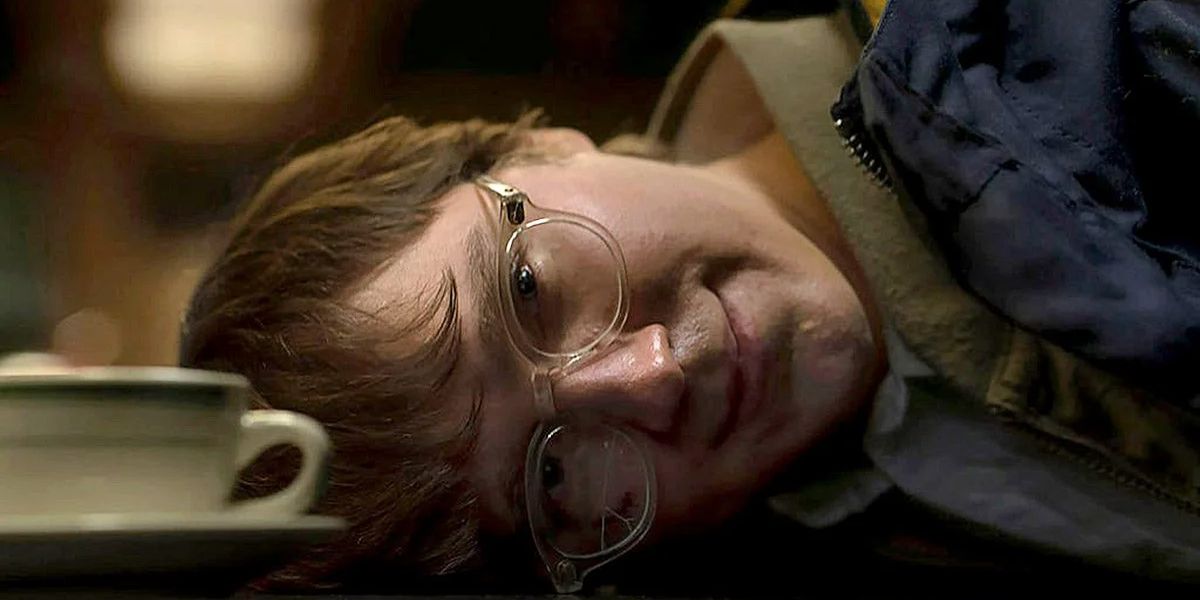 Edward Nashton smiling while laying on a counter in The Batman.