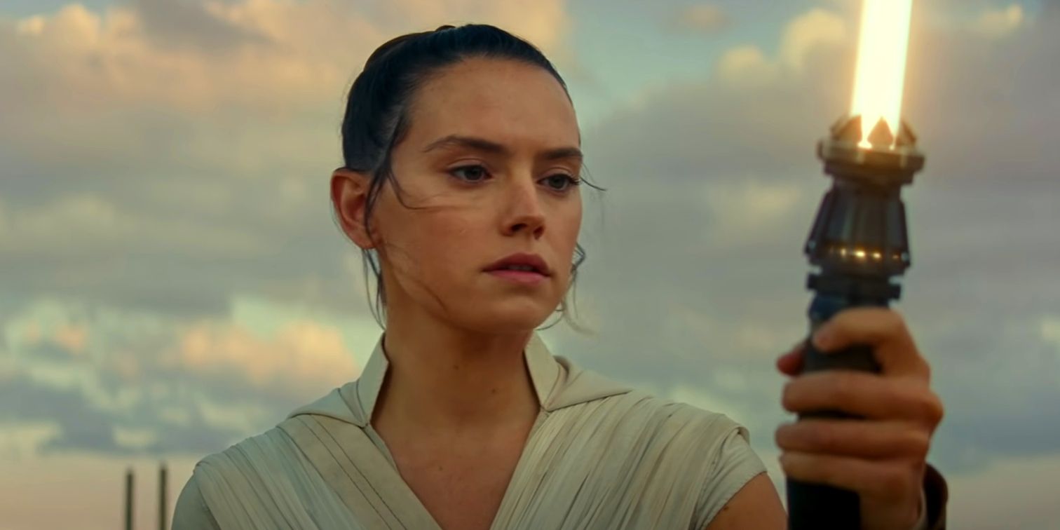 Rey staring at a lightsaber in The Rise of Skywalker