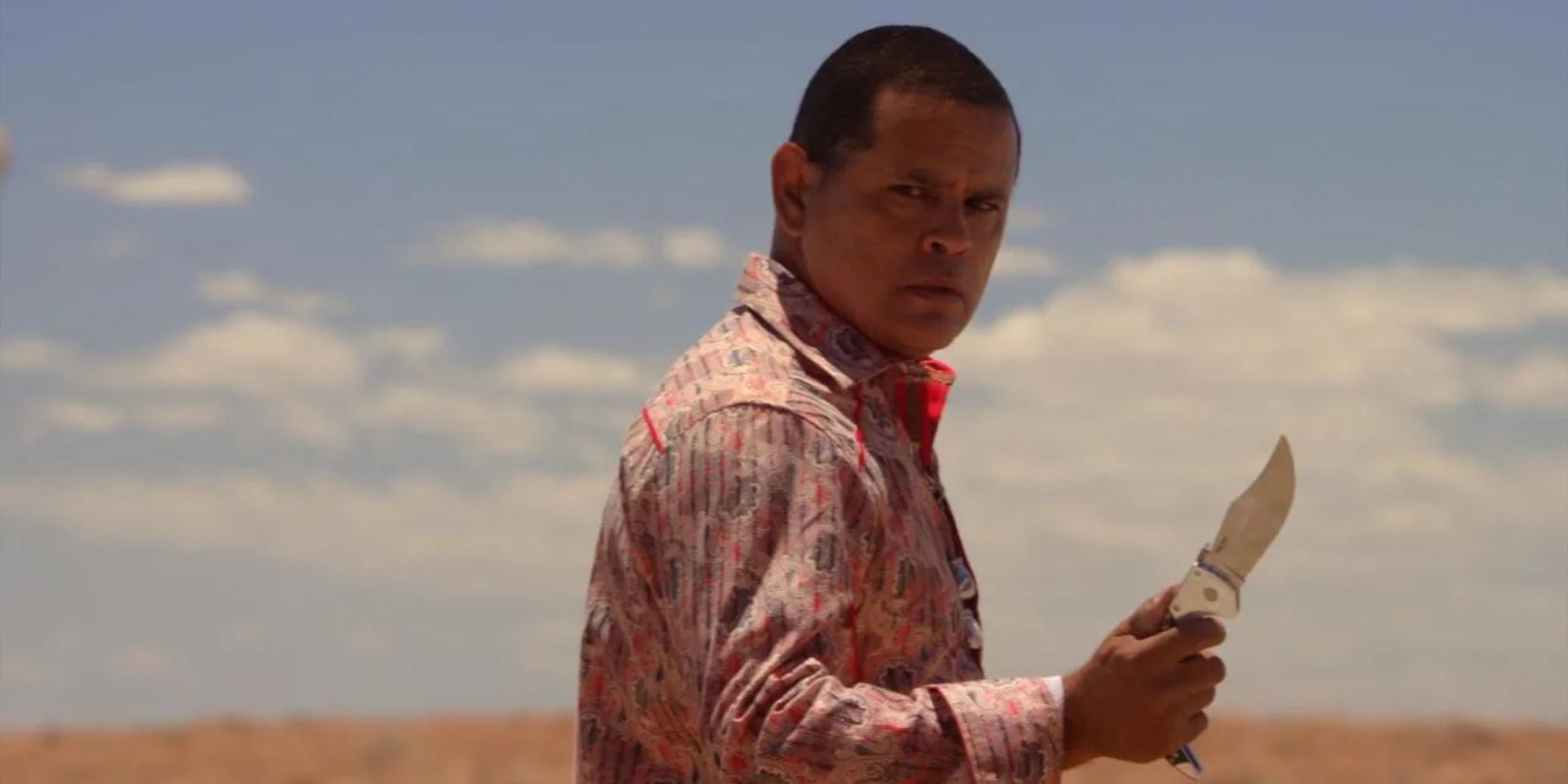 Tuco Salamanca holding a knife in the desert in Better Call Saul
