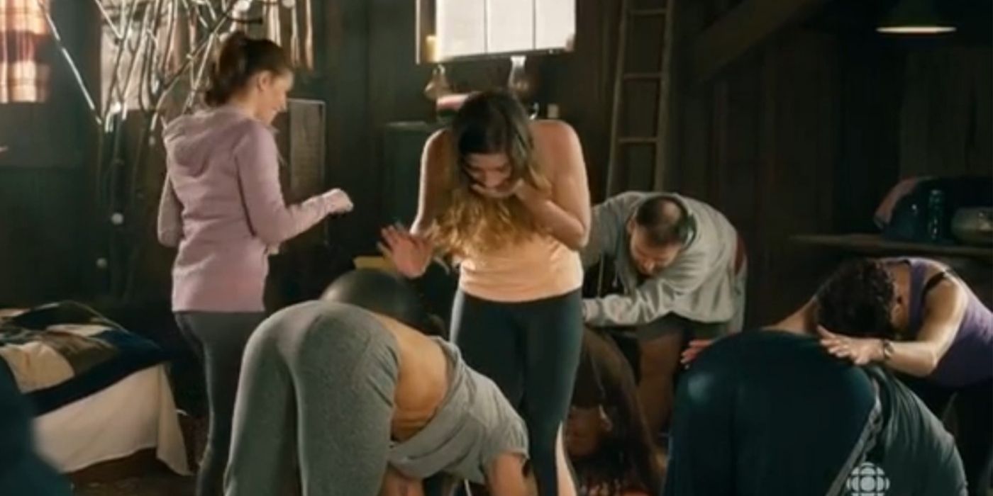 Twyla leads a yoga class with Alexis embarrassed on Schitt's Creek