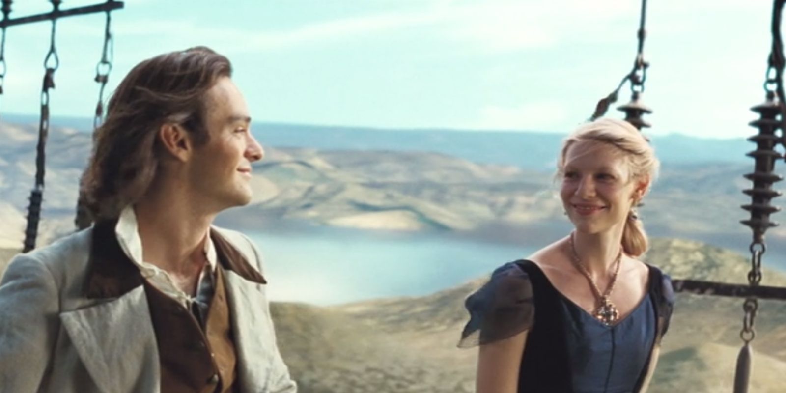 Charlie Cox as Tristan and Claire Danes as Yvaine smile on a boat in Stardust