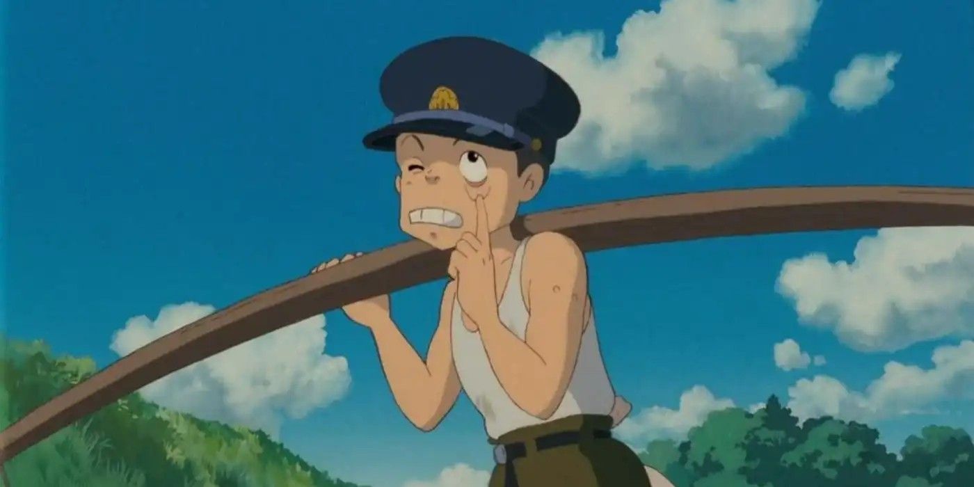 A characters from My Neighbor Totoro with vaccine scars visible on his arms 