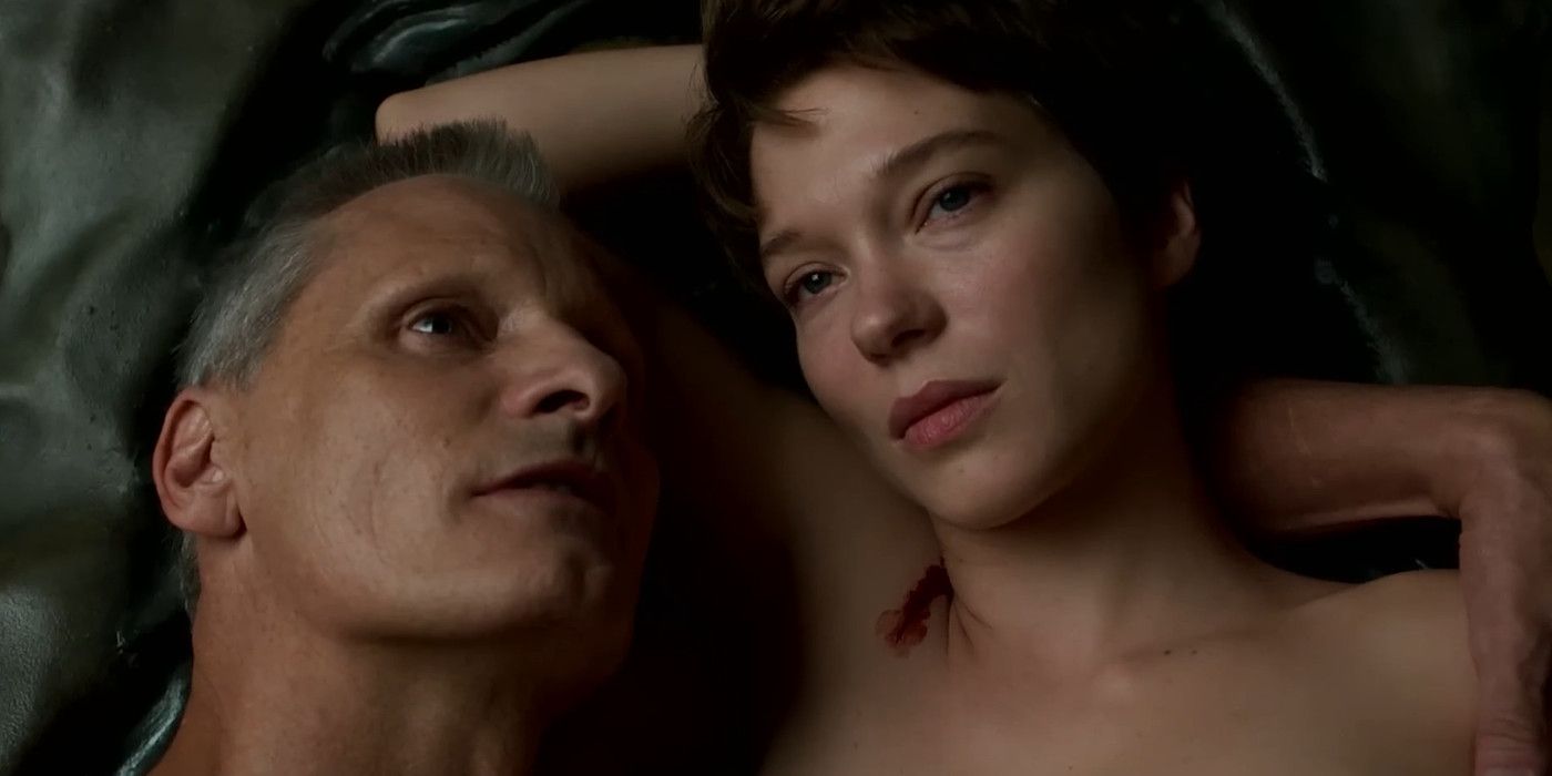 Viggo Mortensen and Lea Seydoux lying in bed in the movie Crimes of the Future