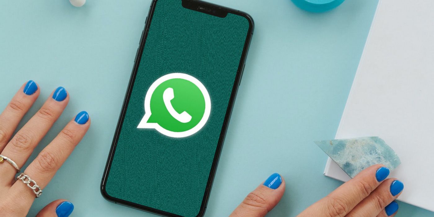 WhatsApp logo with custom background on iPhone 11