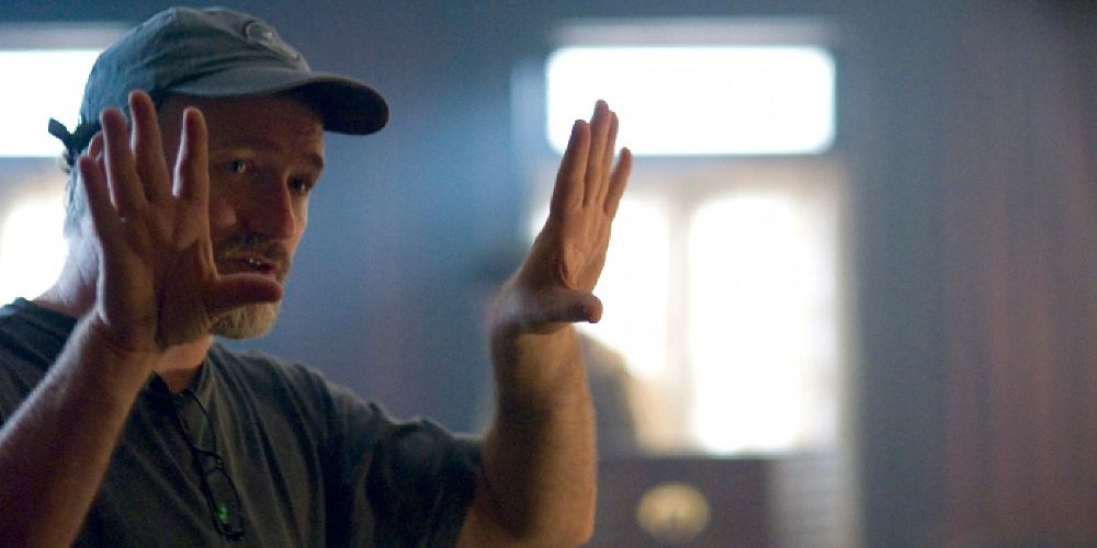 David Fincher frames a shot with his hands