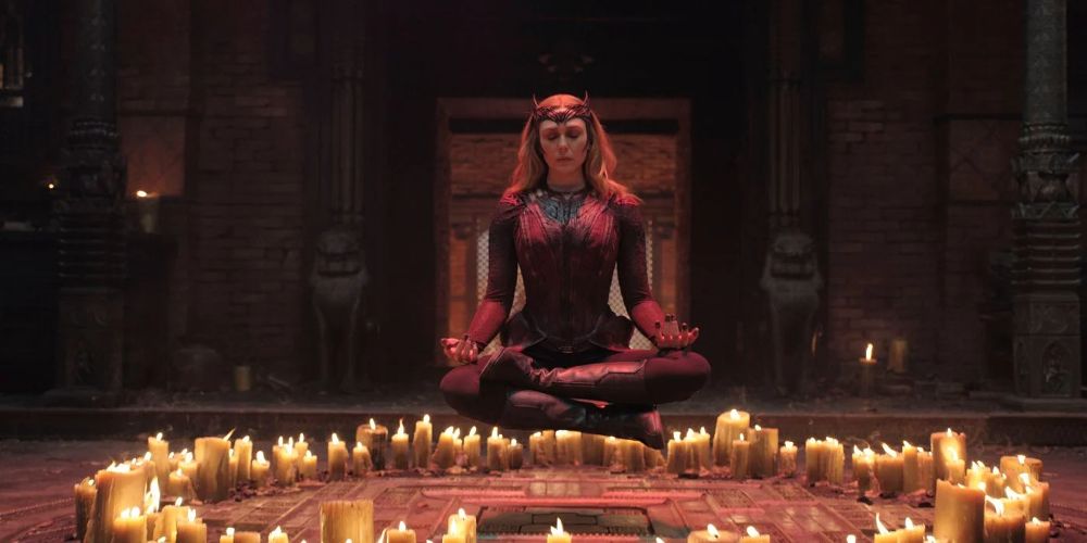 Wanda levitates above a circle of candles in Doctor Strange in the Multiverse of Madness