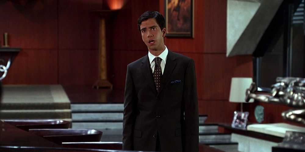 Leonard wears a suit in the office in Fantastic Four