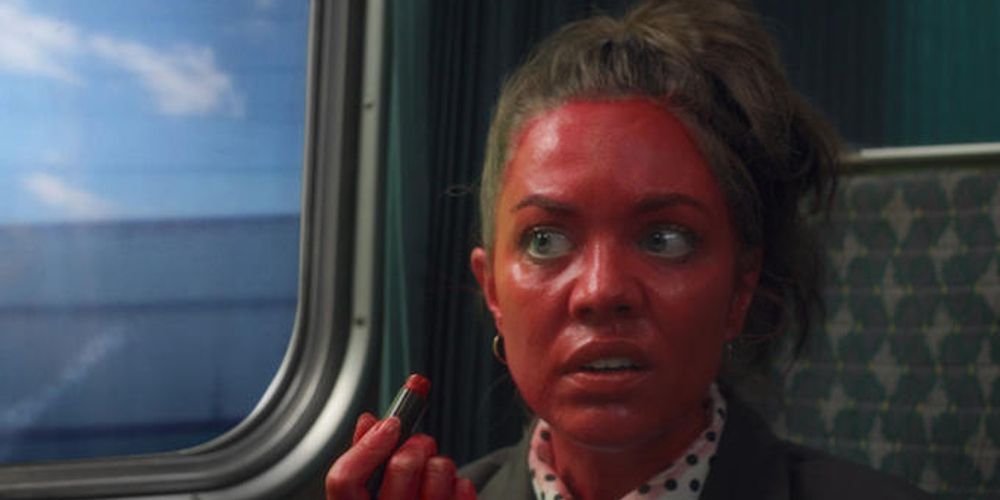 Lipstick Linda sits on a train in The Mind of Herbert Clunkerdunk