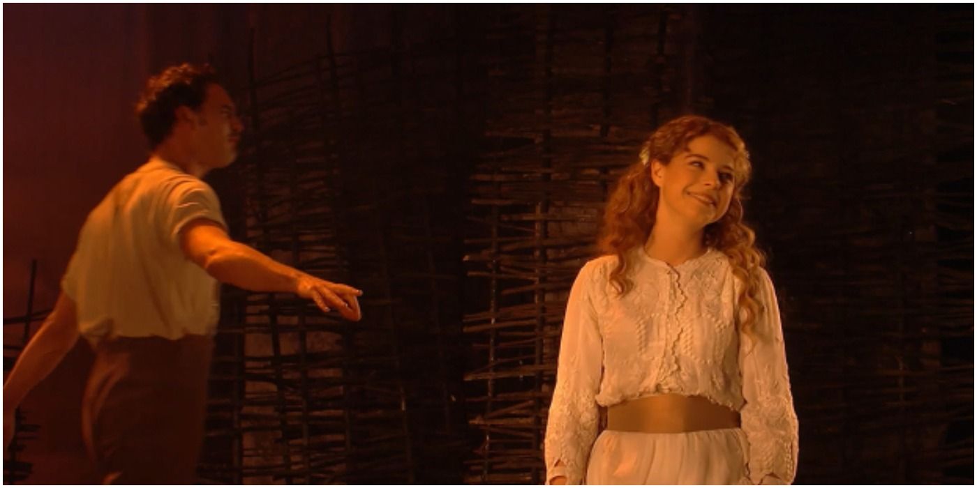 Jessie Buckley smiling on stage in The Winter's Tale