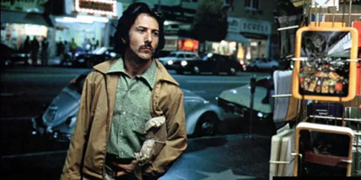 Dustin Hoffman walking at night in a still from Straight Time.