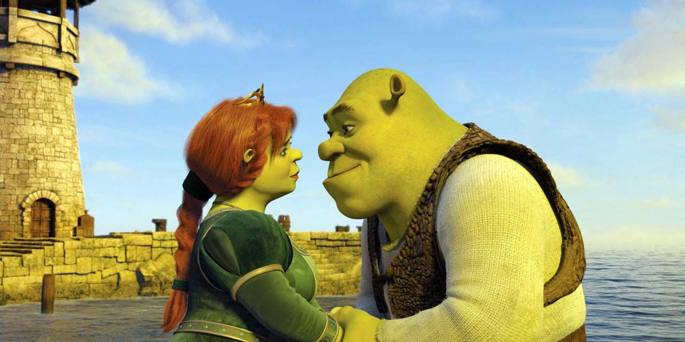Shrek and Fiona holding hands and looking at each other