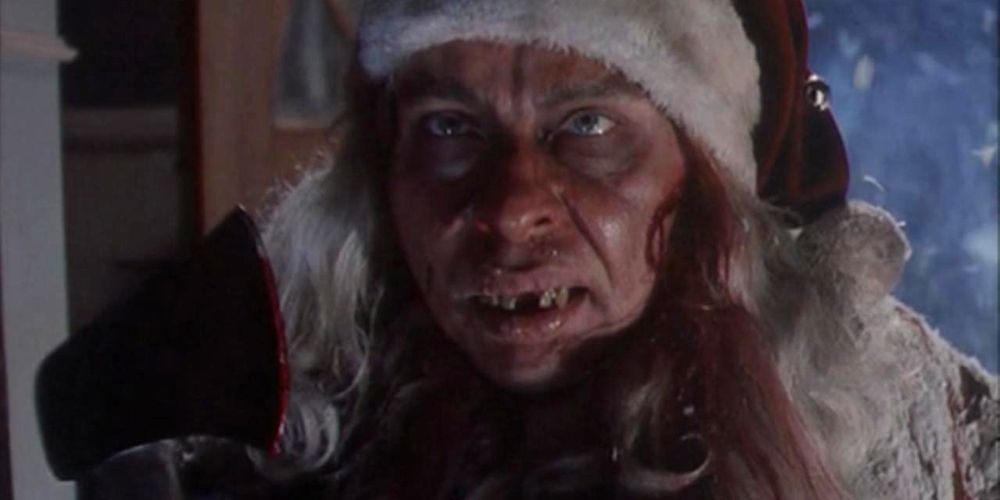 A killer Santa Claus holds an ax in Tales From The Crypt